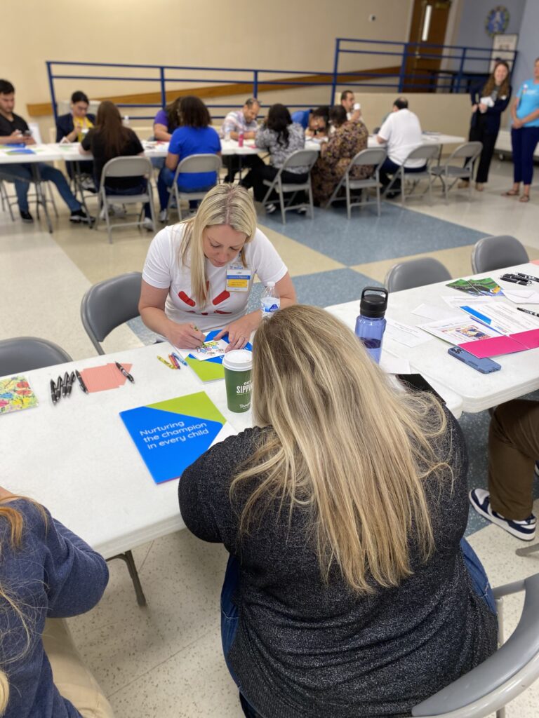 associates from Walmart Markets 290 and 287 gathered at CHoR’s Northside campus, where they created cards for care teams and patients at Brook Road.