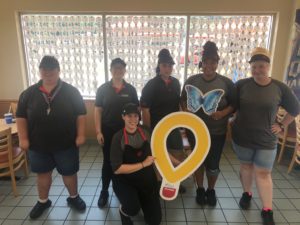Darci (holding the balloon) and her awesome DQ Team