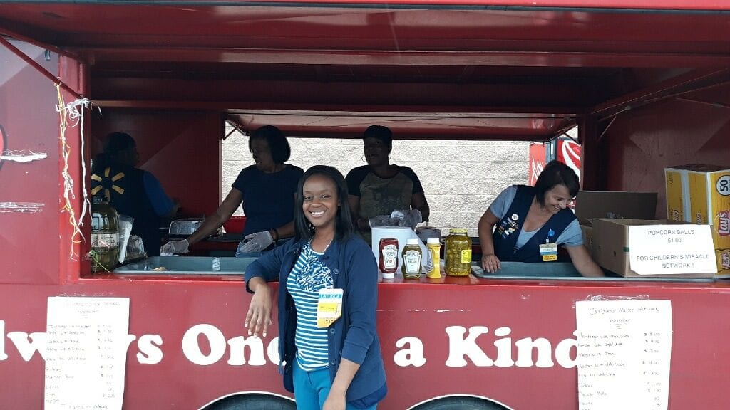 Associates from Walmart 401 in Plaquemine host a food truck with assistance from their partner, Coca-Cola