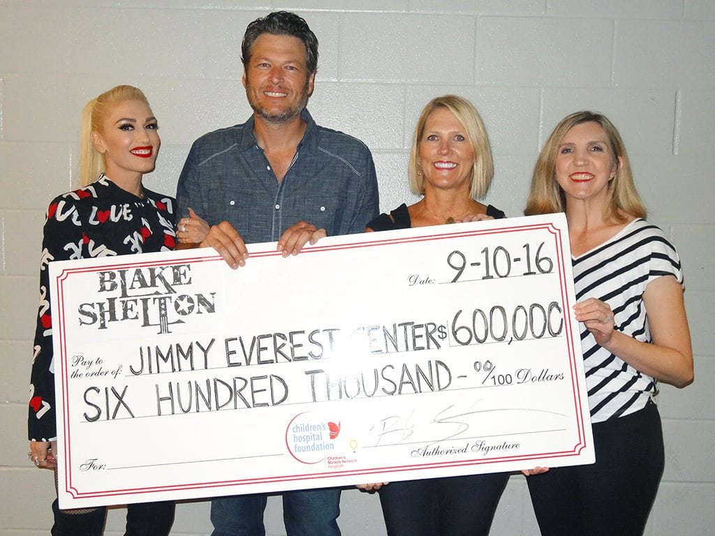 Gwen Stefani and Blake Shelton with Evelyn Bollenbach of Children's Hospital Foundation and Dr. Ashley Baker of the Jimmy Everest Center at the Children's Hospital at OU Medical Center